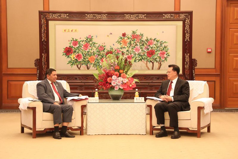 Chinese CPC member and DPM.jpg