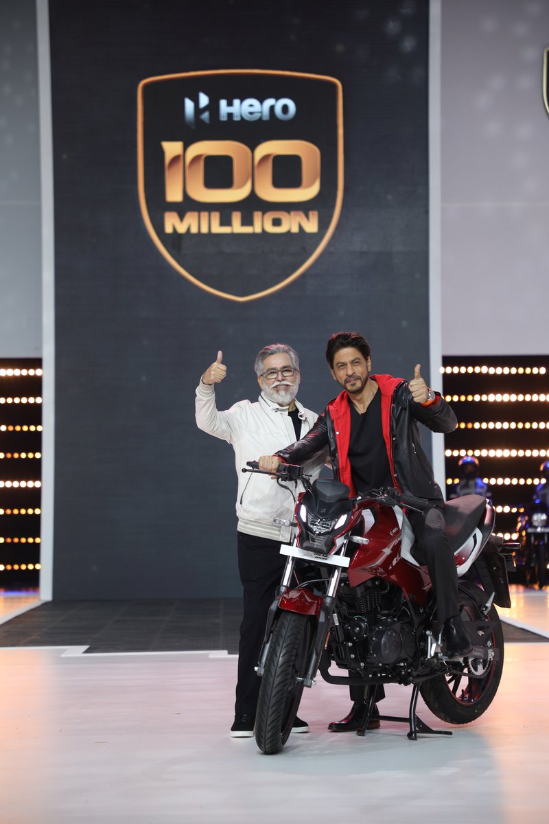 Dr. Pawan Munjal- Chairman and CEO, Hero MotoCorp with global movie icon, Shah Rukh Khan at the unveiling of the company’s 100 millionth motorcycle - The Xtreme 160R (1).JPG