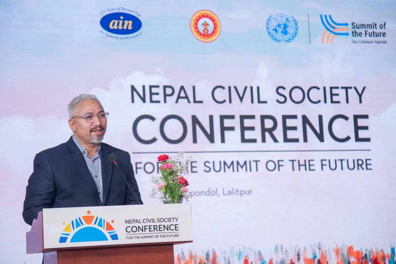 Dr. S. P. Kalaunee, Chairperson of the Association of International NGOs (AIN), speaking at the Nepal Civil Society Conference for the Summit of the Future..jpg